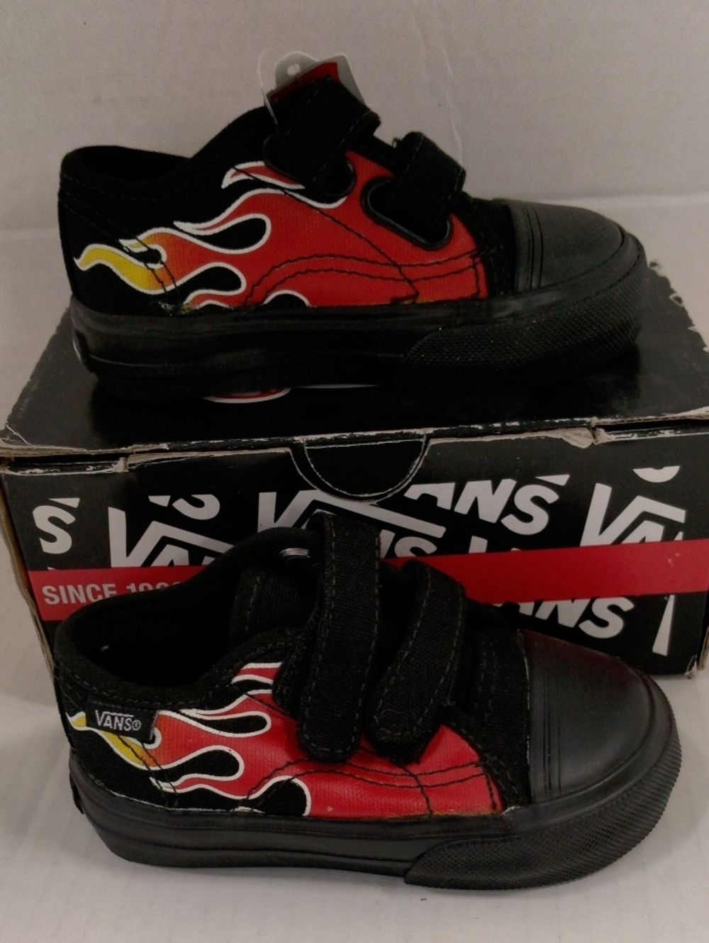 Vans Kids Black Sneakers with Red & Yellow Flame Graphic